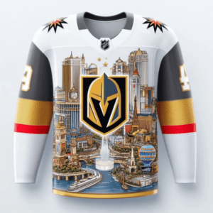 A white and gold hockey jersey with a picture of the vegas golden knights.